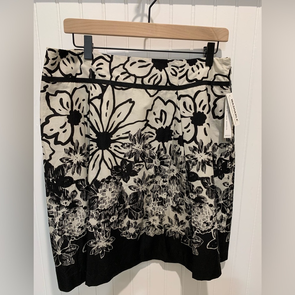 NWT Knee-length floral skirt.
